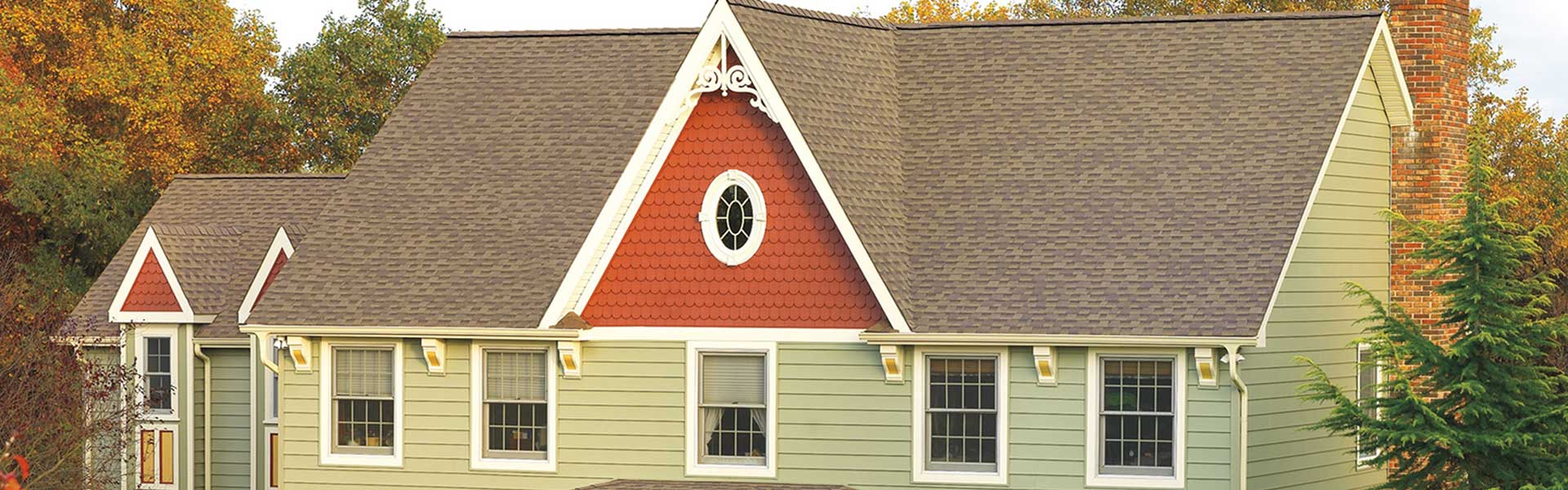 Home with a light brown shingle roof